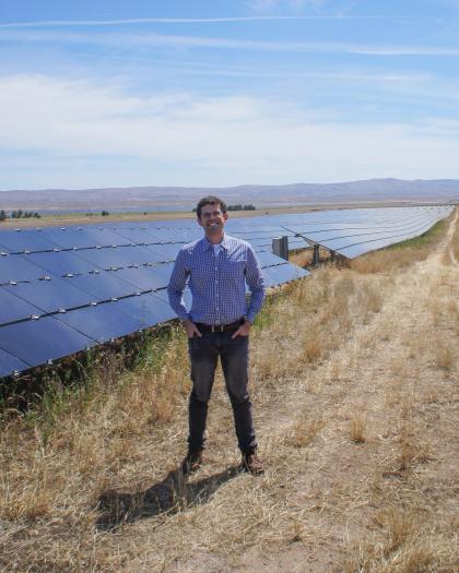 Standing next to a very long solar array