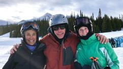 Three people ready to ski