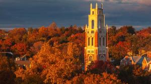 The Tower at Murray College rising above treetops with dramatic fall colors 