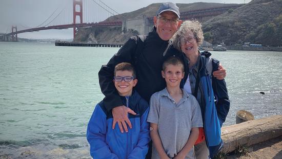 Seton and his family with the Golden Gate Bridge in the background