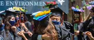 Students embracing at YSE commencement