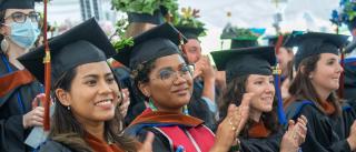 YSE graduates attending commencement ceremonies at Kroon Hall
