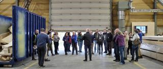 Participants in a 2022 TFD visit a facility in Finland