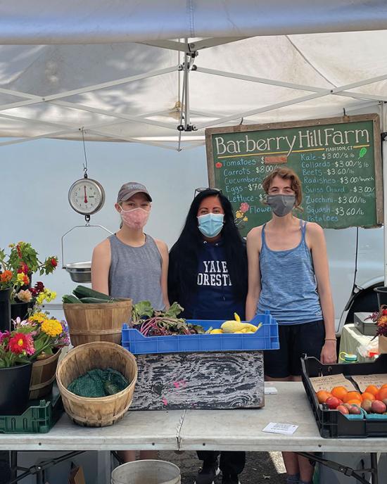 Claudia Ochoa (center) worked with the team from Barberry Hill Farm to market its products at the farmers market in New Haven’s Wooster Square in July 2021.