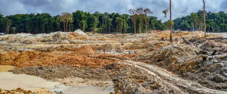 a clear-cut area of the Amazon forest being mined for gold