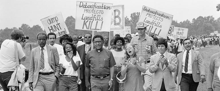Protestors carrying signs in Warren County, North Carolina, 1982