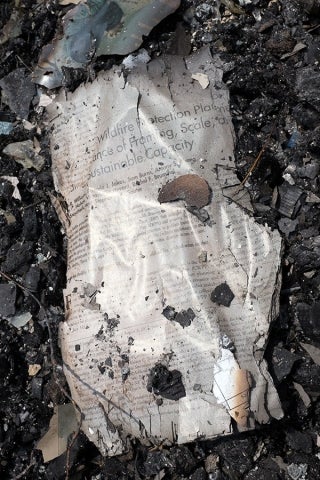 partially burned Journal of Foresty