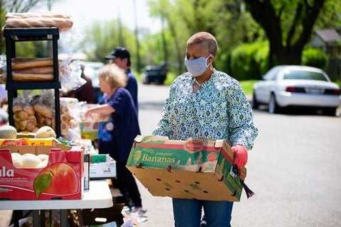 Food being distributed at a drive-up food pantry in Texas