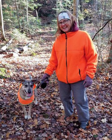 Sarah (Cole) McDaniel with her hiking partner, Cookie