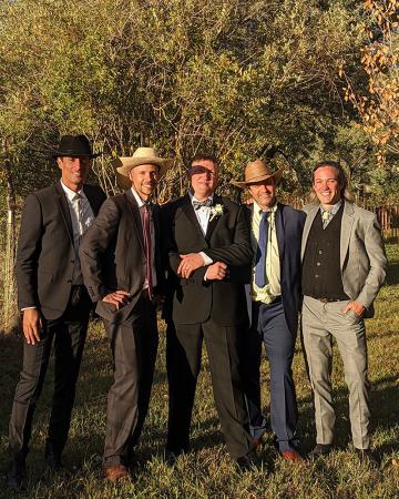 Nasser Brahim ’10, Ben Blom ’10, Eliot Logan-Hines ’10, and Nick Olson ’16 gather for Eliot’s llama Chawar wedding in Taos, New Mexico